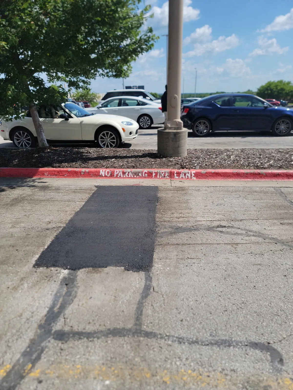 Professional asphalt paving crew serving Lenexa, KS